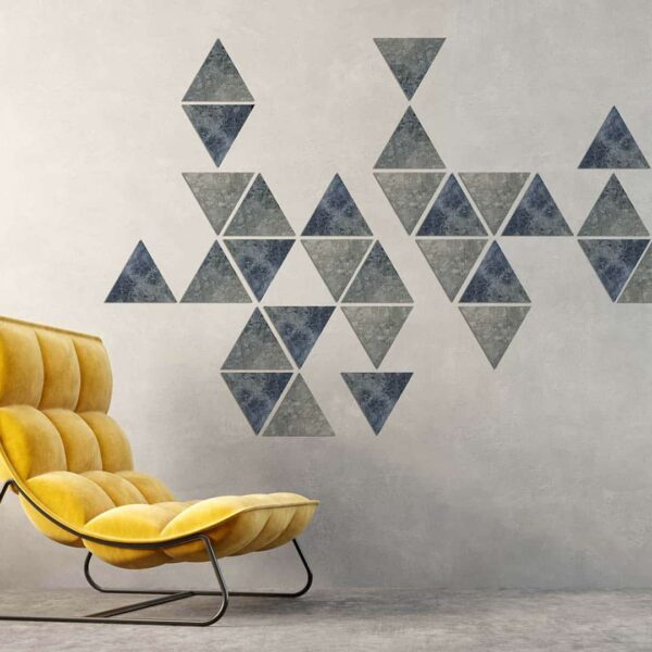 Ambiente sofá triángulos decorativos Stone Bluegreen