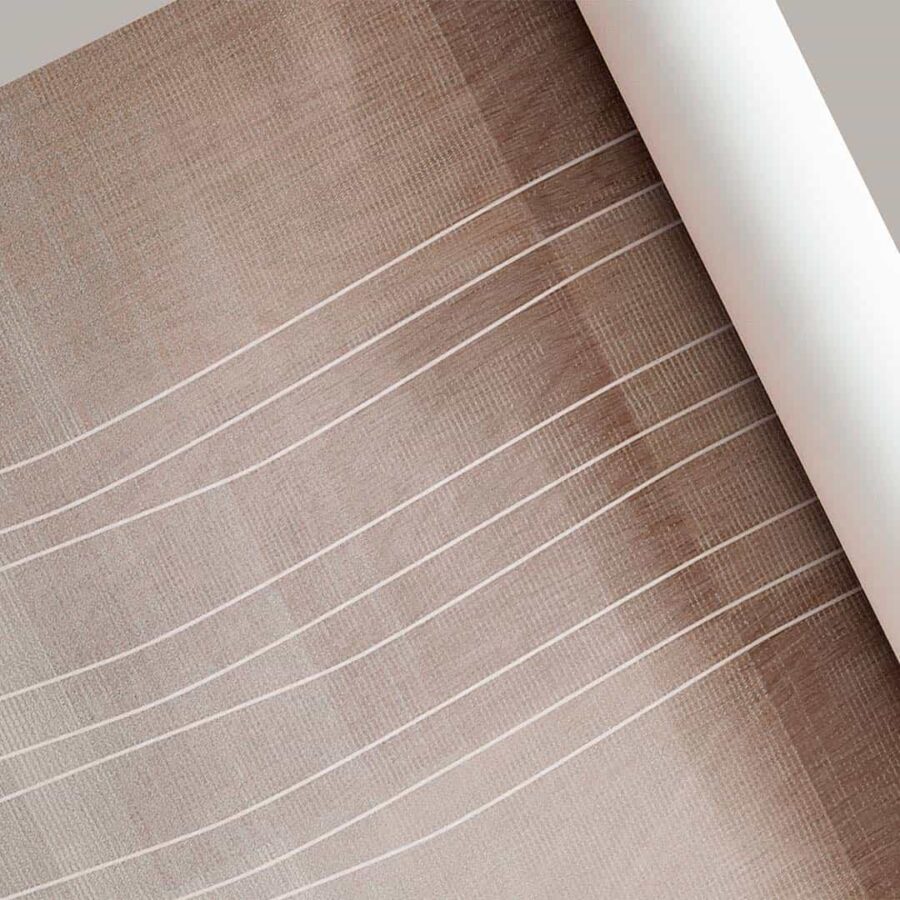 Detalle de la alfombra de vinilo efecto trenzado Liviano en tonos marrones